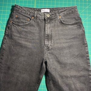 Zara high rise mom jeans with slits at bottom of rack leg.